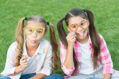 Carefree kids photo booth props funny eyewear outdoors, summer holidays concept