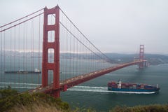Cargo Ship Passing Underneath Golden Gate Bridge Royalty Free Stock Photos Cargo Ship Passing Underneath Golden Gate Bridge Royalty Free Stock Photos