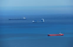 Cargo Ships In Blue Sea Royalty Free Stock Photography