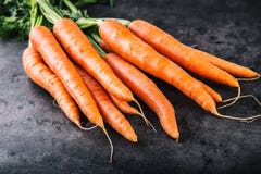 Carotte Groupe frais de raccords en caoutchouc raccords en caoutchouc de chéri d'isolement Carottes oranges organiques fraîches c image stock Carotte Groupe frais de raccords en caoutchouc raccords en caoutchouc de chéri d'isolement Carottes oranges organiques fraîches c image stock