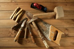 Carpenter tools saw hammer wood tape plane gouge stock photo Carpenter tools saw hammer wood tape plane gouge stock photo