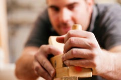 Carpenter With Wood Planer Royalty Free Stock Photo Carpenter With Wood Planer Royalty Free Stock Photo