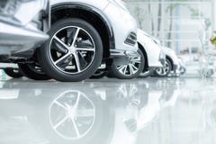 Cars For Sale, Automotive Industry, Cars Dealership Parking Lot. Rows of Brand New Vehicles Awaiting New Owners, on the epoxy royalty free stock image Cars For Sale, Automotive Industry, Cars Dealership Parking Lot. Rows of Brand New Vehicles Awaiting New Owners, on the epoxy royalty free stock image