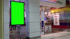 Cartelera verde para su anuncio en la tienda del teléfono móvil metrajes Cartelera verde para su anuncio en la tienda del teléfono móvil metrajes