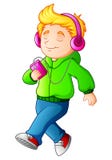 Cartoon boy walking and listening music player Stock Photography Cartoon boy walking and listening music player Stock Photography