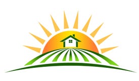 Casa de la granja con el sol