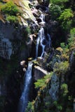 Cascading water of the Toxa River flowing down rock formations in Galicia, Spain stock image Cascading water of the Toxa River flowing down rock formations in Galicia, Spain stock image