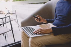 Casual business man or freelancer working on laptop computer and stock images Casual business man or freelancer working on laptop computer and stock images