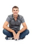 Casual Man Sitting In Lotus Position, Smiling Royalty Free Stock Photos