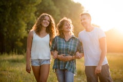 Outdoor portrait of smiling happy senior mother with her children stock image Outdoor portrait of smiling happy senior mother with her children stock image