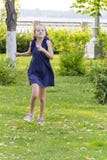 Caucasian girl run in summer with disheveled hair stock image Caucasian girl run in summer with disheveled hair stock image