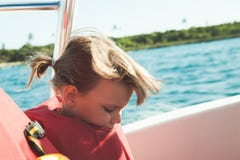 Caucasian little girl in orange life-jacket royalty free stock photo Caucasian little girl in orange life-jacket royalty free stock photo