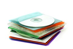 CD em umas capas de plástico coloridas foto de stock royalty free CD em umas capas de plástico coloridas foto de stock royalty free