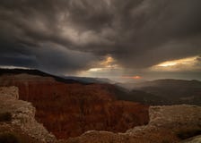 Cedar breaks amphitheater under dark stormy skies at sunset royalty free stock photo Cedar breaks amphitheater under dark stormy skies at sunset royalty free stock photo