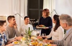 Happy family having dinner party at home stock images Happy family having dinner party at home stock images