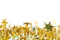 Celebratory Tinsel Of Golden Color With Christmas Stars 2 Stock Photo Celebratory Tinsel Of Golden Color With Christmas Stars 2 Stock Photo