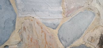 Cement wall and marble pattern, gray, orange for background.