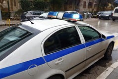 Centelleo ligero azul del coche policía Imagenes de archivo Centelleo ligero azul del coche policía Imagenes de archivo