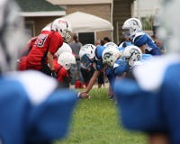 Center preparing to snap the ball. royalty free stock images Center preparing to snap the ball. royalty free stock images