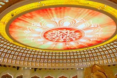 The Centre of Buddhism in Sanya. Temple with Lotus on the ceiling, Golden Buddha and many statues and goddesses. stock photography The Centre of Buddhism in Sanya. Temple with Lotus on the ceiling, Golden Buddha and many statues and goddesses. stock photography