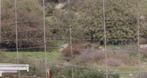 Cerca de la frontera entre Israel y Líbano alambre de púas y cerca electrónica Cerca de la frontera entre Israel y Líbano alambre de púas y cerca electrónica
