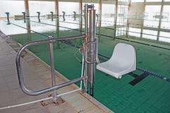 Chair for Entry to the Swimming Pool for the Disabled royalty free stock photos Chair for Entry to the Swimming Pool for the Disabled royalty free stock photos