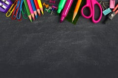 Chalkboard with school supplies top border stock image Chalkboard with school supplies top border stock image