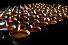 Charity. Praying candles in a monastery in Bhutan. Abstract, candlelight.