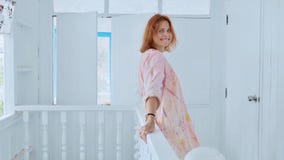 Charming happy young woman smiling and looking at camera stock photo Charming happy young woman smiling and looking at camera stock photo