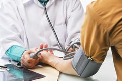 Checking blood pressure stock photography Checking blood pressure stock photography