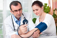 Checking Blood Pressure Royalty Free Stock Photo Checking Blood Pressure Royalty Free Stock Photo