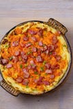 Cheddar Fijngestampte Aardappelbraadpan met Bacon De gebakken Braadpan van de Cheddaraardappel stock afbeelding Cheddar Fijngestampte Aardappelbraadpan met Bacon De gebakken Braadpan van de Cheddaraardappel stock afbeelding