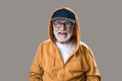 Cheerful male pensioner in fashionable cloth stock photography Cheerful male pensioner in fashionable cloth stock photography