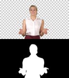 Cheerful young beautiful woman talking to the camera while walking, Alpha Channel stock images Cheerful young beautiful woman talking to the camera while walking, Alpha Channel stock images