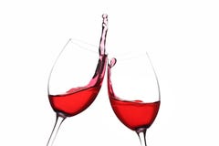 Cheers. A Toast with Red Wine. Splash. stock photos Cheers. A Toast with Red Wine. Splash. stock photos
