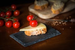 Cheese with cherry stock images Cheese with cherry stock images