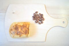 Cheese with peanuts on a chopping board stock photos Cheese with peanuts on a chopping board stock photos