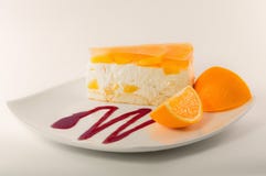 Cheesecake z pomarańcze galaretą obrazy stock Cheesecake z pomarańcze galaretą obrazy stock