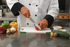 Free Chef Cutting Vegetables Royalty Free Stock Images - 12683589