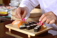 chef preparing sushi