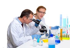 Chemical laboratory with two scientist working Royalty Free Stock Photo Chemical laboratory with two scientist working Royalty Free Stock Photo