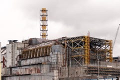 Chernobyl nuclear power plant. View on old destroyed sarcophagus before cover station of new safety confinement. Pripyat royalty free stock photography Chernobyl nuclear power plant. View on old destroyed sarcophagus before cover station of new safety confinement. Pripyat royalty free stock photography