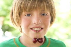 Cherry In The Mouth Royalty Free Stock Photography