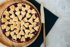 Cherry pie with heart shape decorations stock images Cherry pie with heart shape decorations stock images