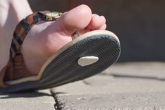 Chewing gum on the shoes, gum spit out on the pavement, step on royalty free stock photo Chewing gum on the shoes, gum spit out on the pavement, step on royalty free stock photo
