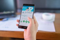CHIANG MAI, THAILAND - May 06,2018: Man hands holding HUAWEI with Waze app on the screen. Waze is the world`s largest community royalty free stock photo CHIANG MAI, THAILAND - May 06,2018: Man hands holding HUAWEI with Waze app on the screen. Waze is the world`s largest community royalty free stock photo