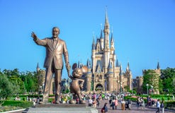 CHIBA, JAPAN: Walt Disney statue with view of Cinderella Castle in the background, Tokyo Disneyland