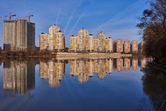 Chic View of the west of Krasnodar from the Kuban River in the winter in the golden hours. New high-rise buildings and clear blue royalty free stock image Chic View of the west of Krasnodar from the Kuban River in the winter in the golden hours. New high-rise buildings and clear blue royalty free stock image