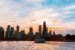 Chicago skyline viewed from the pier on Lake Michigan with sunset sky in the background stock images Chicago skyline viewed from the pier on Lake Michigan with sunset sky in the background stock images