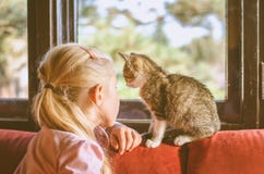 Child And Cat Together Royalty Free Stock Photography